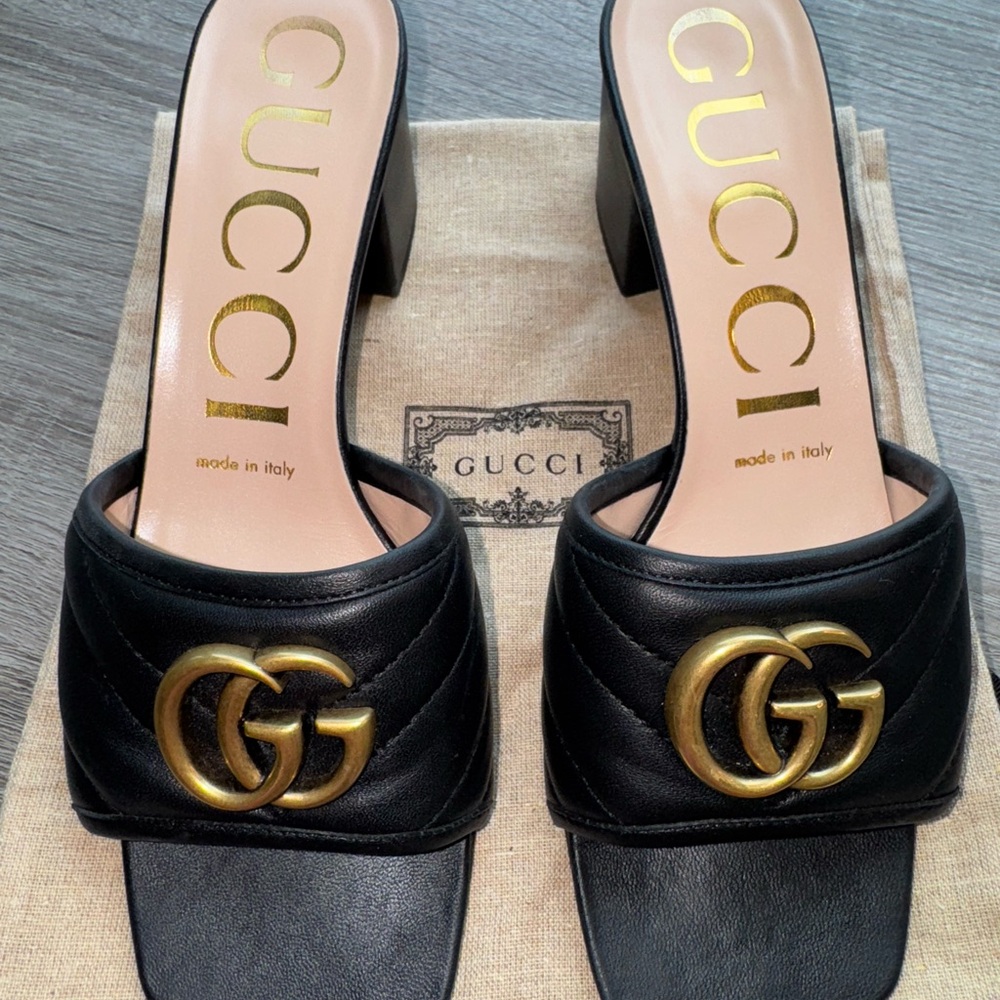 Gucci Black Leather Mules with Gold Logo